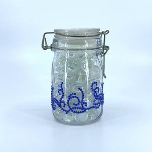 Airtight glass storage jar with clasp lid. Blue Diamond Dotz swirls rhinestones